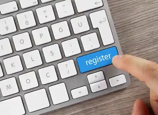 Finger on a keyboard for an online registration system